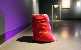 Medium: poured latex-enamel paint, yarn thread, fabric, bags of top soil, sprouting potato, cellophane, water